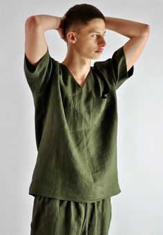 Comfort is a men's best friend so here I present you with the ultimate of comfort that men can get! Not just another boring t-shirt. It is a super quality linen top that will never allow you to sweat as the fabric absorbs body moisture better that any fabric on earth. It is made of 100% linen! Non stretchy and wrinkles beautifully as a quality linen suppose to. Khaki pants available separately. Why linen? Linen is the best clothing fabric for coolness and comfort in warm weather and hot climates Khaki Linen Short Sleeve Tops, Khaki Linen Tops With Pockets, Green Linen Loungewear Tops, Green Linen Tops For Loungewear, Green Linen Tops With Pockets, Clothing Fabric, Tracksuit Tops, Linen Tshirts, Best Clothing