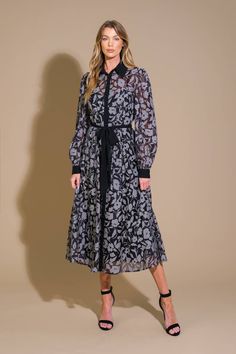 A woven jacquard midi dress, featuring shirt collar, button down, long sleeve with cuff, cinched waist with contrasting self sash and full skirt Details: Self : 40% Polyester 30% Nylon 30% CottonContrast : 100% PolyesterLining : 100% Polyester Size & Fit - Model is 5`8" And Wearing Size Small- Measurements Taken From Size Small- Approx. Length: 48" Black Belted Midi Dress For Semi-formal Occasions, Fall Midi Dress With Spread Collar, Formal Spread Collar Midi Dress For Fall, Formal Fall Midi Dress With Spread Collar, Formal Midi Dress With Spread Collar For Fall, Black Button-up Semi-formal Dress, Semi-formal Long Sleeve Dress With Tie Waist, Semi-formal Long Sleeve Tie Waist Dresses, Black Belted Collared Dress