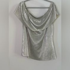 This Is A New With Tag A.N.A. Brand Off-Shoulder Silver Metallic Blouse. This Has A Metallic Foil Look To It And I Think It’s Perfect For A Party Or Holiday Celebration! It’s A Size Xl. Pink Floral Blouse, Metallic Blouses, Rayon Top, Velvet Blouses, Cold Shoulder Blouse, Chevron Stripe, Metallic Foil, Peasant Blouse, Crop Blouse