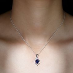 Product Details Enhance your style with the alluring charm of this Teardrop Pendant, designed to captivate and fascinate. The pear-shaped Created Blue Sapphire, held securely in place by a prong setting, adds a touch of mesmerizing beauty to your look. The teardrop design of the necklace features Moissanite accents, not only enhancing its elegance but also providing protection against negative energies. Product Information SKU SHP-PENDANT052310143 Weight 4.40 gm (Approximate) LAB CREATED BLUE SA Saphir Necklace, Diamond Teardrop Pendant Necklace With Sapphire, White Gold Sapphire Teardrop Pendant Jewelry, Sapphire Teardrop Pendant Necklace Gift, Elegant Sapphire Teardrop Pendant Jewelry, Sapphire Teardrop Pendant Fine Jewelry, Sapphire Diamond Necklace, Sapphire Necklace Pendants, Blue Sapphire Pendant