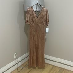 Beautiful Gold Dresses Gold Floor-length Midi Dress For Parties, Gold Maxi Length Dress For Holiday, V-neck Maxi Dress For Dinner Parties, Gold Floor-length Midi Dress For Evening, Holiday Floor-length Maxi Dress For Date Night, Sequin V-neck Maxi Dress For Date Night, V-neck Sequined Maxi Dress For Date Night, Holiday V-neck Maxi Evening Dress, Holiday Maxi Dress For Date Night