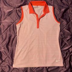 Nike Golf Dri-Fit Sleeveless Collared Top Size: Medium Color: Orange And White Stripes Cons: New With Tags Nike Zip Hoodie, Nike Cropped Hoodie, Nike Track Jacket, Tennis Tops, Collared Top, Nike Zip Up, Nike Workout, Nike Tank Tops, Nike Training