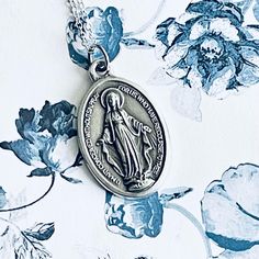 Double Sided Our Lady Of Miraculous Medals From Italy  Necklace Pendant  Silver Plated Chain Measures 18 Inches Lobster Clasp Closure All items come in Gift Box and Organza Gift Bag Inscribed "O Mary, conceived without sin, pray for us who have recourse to you.". Ships within 3 days. Will ship first class mail.  See our shop Hello Emiko for more beautiful handmade jewelry and gifts. Italy Necklace, Catholic Jewelry, Pray For Us, Miraculous Medal, Religious Jewelry, Organza Gift Bags, Pendant Silver, Silver Pendant Necklace, Our Lady