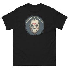 Camp Crystal Lake - Jason Voorhees Mask - Custom Halloween Unisex T-Shirt Multiple sizes and color styles available! 100% Cotton! True to size! Get all of your custom Halloween design products from The Black Cat Curio Shop! This product is made especially for you as soon as you place an order, which is why it takes us a bit longer to deliver it to you. Making products on demand instead of in bulk helps reduce overproduction and waste and reduces negative impact on the environment! So thank you for making thoughtful purchasing decisions and your understanding! Jason Voorhees Mask, Curio Shop, Camp Crystal Lake, The Black Cat, Jason Voorhees, Crystal Lake, Design Products, Halloween Design, The Black