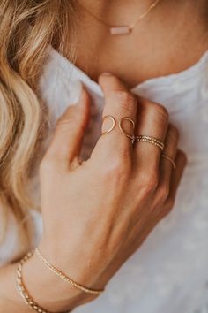 Our Revolve Cuff is such a crowd pleaser we made a ring version of it and the obsession is real. Wire is hand-shaped and hammered for texture. Available in 14kt Gold Fill + Sterling Silver. Wear it two ways: open side up or down. Kimmie pairs it with two of our Confetti Ring and Teeny Tiny Bands. Abbie stacks it with our Beaded Ring and Squiggle Ring. Handmade in Eau Claire, WI. Our jewelry is handmade so each piece will be unique and may vary slightly from what is pictured. Dainty Polished Finish Open Ring Jewelry, Silver Sterling Amethyst Open Ring, Dainty Hammered Stackable Open Rings, Yellow Gold Sterling Silver Open Crystal Ring, Yellow Sterling Silver Open Ring, Everyday Wear Jewelry, Midi Rings, Jewelry Cleaner, Beaded Rings