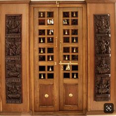 an ornate wooden door with glass inserts