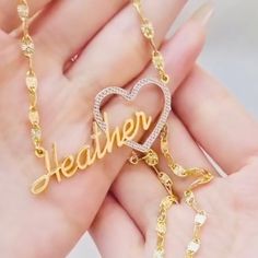 Show your love and appreciation with this stunning custom heart name pendant. This pendant features a two tone design of 10k vermeil gold and sterling silver, creating a beautiful contrast and a unique look. The pendant is shaped like a heart, with a cut-out of your chosen name in the center. The name is also plated with 10k vermeil gold, adding a touch of elegance and sparkle. The pendant comes with a 10k gold 18 inch matching chain, making it ready to wear or gift. This pendant is a perfect wa Customized Gold Double Heart Necklace, Customized Gold Heart Necklace For Mother's Day, Customizable Gold Heart Necklace For Mother's Day, Gold Double Heart Name Necklace, Gold Heart Necklace With Name For Mom, Gold Heart Nameplate Necklace, Gold Nameplate Heart Necklace, Personalized Name Necklace With Heart Pendant, Gold Double Heart Name Necklace As Personalized Gift