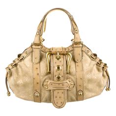 A stunning beige & gold suede and ostrich skin bag by Louis Vuitton Designed by Marc Jacobs This bag was produced in a very limited edition and made to order Finest suede leather imprinted with the famous LV monogram logo Golden hardware Ostrich skin trimming Lined with champagne-colored satin fabric Made in France Retailed for circa 8995$ plus taxes Please refer to the AD and editorial pictures for size / season reference only. The bag on sale is the same model however in the beige color. See a Men With Bags Fashion, Gold Monogram Canvas Shoulder Bag With Double Handle, Luxury Gold Satchel With Handle Drop, Gold Monogram Canvas Shoulder Bag With Handles, Gold Monogram Canvas Satchel Shoulder Bag, Gold Tote Bag With Palladium Hardware, Gold Monogram Canvas Bag With Gold-tone Hardware, Luxury Gold Textured Leather Satchel, Ostrich Leather Bags