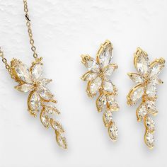 Introducing the Bridal Jewelry Set for Bride! If you’re a bride-to-be looking for striking and elegant wedding adornment, this special set is perfect for you. Carefully crafted with Delicate Cubic Zirconia, the necklace, and earrings in this set allude to luxury as their crystal leaf shapes create a stunning look. This jewelry set is incredibly versatile, exuding charm during the ceremony and a delightful sparkle at the reception. Whether it’s for your special day or for your bridesmaids, this d Luxury Wedding Jewelry, Gold Bridesmaid Jewelry, Gold Bridal Jewelry, Jewelry Set Gold, Gold Bridesmaids, Gold Bridal Jewellery Sets, Bridal Jewelry Set, Rose Gold Crystal, Jewelry Dainty