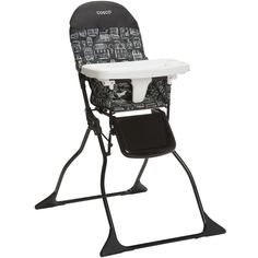 a black and white baby high chair with a seat on it's back legs