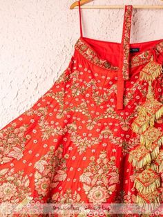 Red And Rose Pink Raw Silk Bridal Lehenga With Embroidery And Net Dupatta (Set of 3) Fabric details: Lehenga - Raw Silk Blouse - Raw Silk Dupatta - Net Embroidery: Lehenga - Zardosi, Resham And Sequence Work Blouse - Zardosi, Resham And Sequence Work Dupatta - Zardosi, Resham And Sequence Work Wash Care Instructions: Dry clean only Note: This product is made to order. No returns The product will be shipped within 4-6 weeks of the order placed Red Anarkali Lehenga With Floral Embroidery, Red Floral Embroidered Floor-length Sharara, Red Floor-length Lehenga With Floral Embroidery, Red Floral Embroidered Lehenga For Navratri, Red Floral Embroidered Floor-length Lehenga, Red Floral Embroidered Sharara With Traditional Drape, Red Floral Embroidered Lehenga For Diwali, Red Traditional Drape Sharara With Floral Embroidery, Traditional Lehenga With Floral Embroidery For Ceremonies