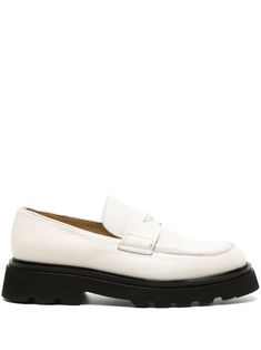 bone white calf leather penny slot almond toe slip-on style branded leather insole contrasting chunky rubber lug sole Modern White Slip-ons For Work, White Leather Slip-ons With Leather Footbed, Modern White Slip-on Loafers, Classic Leather Slip-ons With Lug Sole, White Platform Loafers With Lug Sole For Work, White Slip-on Loafers With Contrast Sole, Formal White Loafers With Lug Sole, White Office Loafers With Lug Sole, White Leather Loafers With Lug Sole