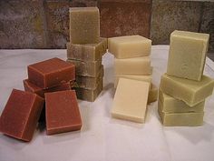 several different types of soaps stacked on top of each other