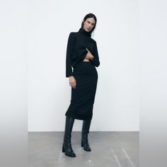 High-Waisted Midi Skirt With Elastic Waistband. Black | 5070/454 Black Straight Midi Skirt Outfit, Chic Winter Pencil Skirt, Elegant High Waist Winter Mini Skirt, Elegant High Waist Mini Skirt For Winter, Elegant Mini Pencil Skirt For Winter, Fitted Black Pencil Skirt For Winter, Stretch Skirt For Winter Workwear, Stretch Winter Skirt For Workwear, Stretch Winter Workwear Skirt