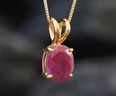 Red Ruby Gold Pendant set with a Natural Ruby in a diamond cut & natural red color, at size 10x8mm (3 Cts) from Burma.Gold Vermeil: 18k Gold over Solid 925 Sterling Silver ☞ made to last. Matching Ring & Matching Earrings - please ask me Details:• Natural Ruby sourced from Burma• Ruby: 10x8mm, 3 Cts, diamond cut• Pendant Height 17mm, Width 8mm• Free Complimentary Chain• 18k Gold Vermeil❀ Each Natural Gem is unique & will have Slight variations from the product pictures "no two Natural Stones are Oval Ruby Jewelry With Faceted Detail, Oval Faceted Ruby Jewelry, Faceted Oval Ruby Jewelry, Gold Pendant Set, Ring Matching, Ruby Pendant, Matching Ring, Ruby Necklace, Matching Rings