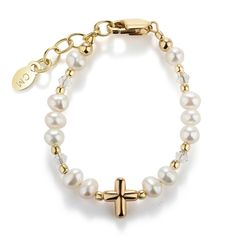 This keepsake bracelet is made with genuine high-end Austrian simulated pearls and 14K Gold-plated beads accented with a dainty cross embellished in the center! This is a high quality bracelet in sterling silver with 14K gold plating with high-end crystals. This makes a very special baptism, christening, or dedication gift or First Communion Keepsake. Each bracelet has an adjustable extension chain, as the child grows just move to the next link for a perfect fit. This jewelry is available in thr Baptism Bracelet, Communion Gifts Girl, Bracelet With Cross, Gift For Granddaughter, First Communion Gifts, Communion Gifts, Cross Bracelet, Gold Cross, Cross Charms