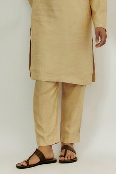 Beige kurta with zardozi and marodi work gold thread embroidery. Paired with a matching straight pant. - Aza Fashions Eid Traditional Straight Pants With Zari Work, Traditional Kurta With Dabka Work And Straight Pants, Designer Kurta For Diwali With Straight Pants, Traditional Straight Pants With Zari Work, Designer Chanderi Bottoms For Eid, Traditional Festive Sets With Straight Pants, Traditional Designer Pants For Navratri, Traditional Designer Bottoms For Navratri, Unstitched Traditional Wear Straight Pants For Eid