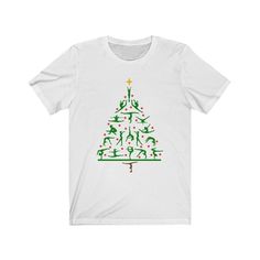 a white t - shirt with an image of a christmas tree and people on it