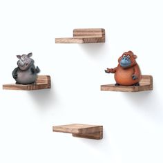 three cartoon animals are sitting on wooden shelves