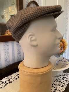 Made by Ascot Caps, this newsboy hat is 40 per cent wool, 55 per cent polyester and 5 per cent other fibres, in classic shades of light moss green, light brown and dark brown. The hat has one snap on the brim. It is fully lined with rusty brown fabric lining. Fits men's size 7 1/8. In very good condition. Classic Wool Beret With Short Brim, Classic Wool Hat, Classic Felt Cap For Winter, Classic Wool Flat Cap Beret, Classic Fitted Felt Cap, Classic Wool Brimmed Beret, Classic Winter Felt Cap, Classic Brimmed Wool Beret, Vintage Brown Beret For Winter