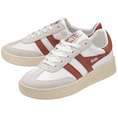 Buy Gola women's Dropshot sneakers in white/orange online at Gola.co.uk Retro Sneakers With Gum Sole For Sports, Retro Low-top Sneakers With Rubber Sole, Vintage Sneakers With Rubber Waffle Outsoles And White Sole, Vintage Sneakers With White Sole And Rubber Waffle Outsoles, Retro Sneakers With White And Gum Sole, Retro Sports Sneakers With White Sole, Vintage White Sneakers With Cushioned Footbed, Vintage Lace-up Sneakers With Cushioned Footbed, Retro Sneakers With Branded Insole And White Sole