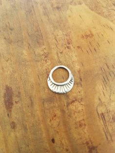 Ethnic tribal indian nose ring silver septum of tribal jewelry style.Boho dainty fashion septum piercing ideas for septum jewelry.Septum tribal design made in 925 silver. SIZE:12mm x 14mm. GAUGE: 20 INNER SIZE: 9 mm YOU CAN FIND SOME SIMILAR MODELS IN: https://www.etsy.com/es/listing/531731587/septum-piercing-plata-pendiente-nariz?ref=shop_home_active_7 https://www.etsy.com/es/listing/517889058/septum-piercing-silver-septum-ring?ref=related-6 https://www.etsy.com/es/listing/531722915/septum-plat Dainty Septum, Dainty Fashion, Septum Earrings, Beach Jewelry Boho, Indian Nose Ring, Ear Hangers, Lotus Earrings, Septum Jewelry, Minimal Earrings