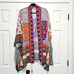 Rachel Zoe Multi-Color Floral Sheer Open Front Tunic Cardigan Shawl Blue, Orange, Teal, Pink, Yellow, White, Green Loose Fit Spring Summer Bathing Suit Cover Womens Size: One Size New Condition: New With Tags Multicolor Cardigan For Vacation, Orange Patchwork Outerwear For Spring, Multicolor Floral Print Long Sleeve Cardigan, Multicolor Floral Print Open Front Outerwear, Multicolor Floral Print Outerwear One Size, One Size Multicolor Floral Print Outerwear, Multicolor Floral Print One-size Outerwear, Multicolor Open Front Outerwear With Floral Print, Orange Long Sleeve One Size Cardigan