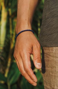 Handcrafted with rich blue Lapis Lazuli and accented with a single sterling silver bead, this piece is an easy and timeless addition to any man's jewelry collection. Sterling Silver Lapiz Lazuli 4mm Thickness Lobster Clasp Handcrafted in LA Lapis Lazuli: Wisdom, Protection, Intellectual Clarity, Emotional Healing Determining your bracelet size: Encircle your wrist with a flexible tape measure and record the measurement. Add 1/2 to 1 inch to your wrist measurement for a comfortable bracelet fit. Everyday Blue Jewelry With 8mm Beads, Pearl Jewelry Gift, Blue Lapis Lazuli, Stacked Jewelry, Blue Lapis, Silver Bead, Gold Collection, Emotional Healing, Tape Measure