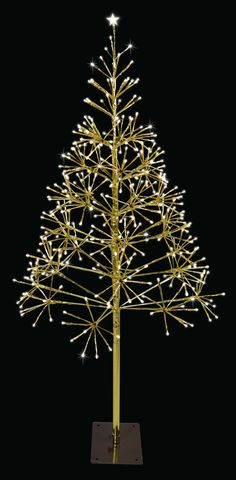 a lighted christmas tree on a stand with lights in the shape of branches and leaves