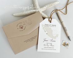 wedding stationery with starfish and envelopes