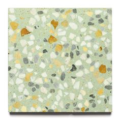 an abstract painting with gold, white and grey rocks on green paper that looks like it has been painted