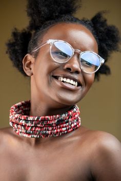 Unique African Maasai Handcrafted Yarn Necklace with an Elegant Look and Brilliant Finish. Made of Strong Silk Yarn. **GET FREE SHIPPING FOR ADDITIONAL ITEMS PURCHASED. Size (Around the Neck)-16 Inches. Color-Red, Black, and White. Get a pair of Matching Earrings and 2 Bracelets for an extra $7. Yes, Buy Multiple Items and pay shipping for 1 item only- The rest ships Free. (No Limits on the number of Multiple items). With a faster delivery time of 3 days via DHLExpress, Worldwide. Ordinary/Stand Multicolor Hand Wrapped Jewelry, Multi-strand Fair Trade Festival Jewelry, Multi-strand Fair Trade Jewelry For Festivals, Fair Trade Multi-strand Festival Jewelry, Fair Trade Red Jewelry For Festivals, Red Fair Trade Jewelry For Festivals, Bohemian Handmade Choker, Handmade Multi-strand Choker, Red Handwoven Beach Jewelry