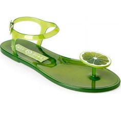 Polyvinyl Chloride Upper. Buckle Closure. Round Toe. Electroplated Gold Seashell Motif. Polyvinyl Chloride Outsole. Imported. Shoe Weight: 0.5 Oz. Lime Scented Bin: 6 Lime Accessories, Jelly Flats, Bow Sandals, Polyvinyl Chloride, Jelly Sandals, Metallic Blue, Katy Perry, Green Fashion, Strappy Sandals