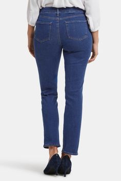 If you like our sculpting, smoothing Marilyn Straight Jeans, you're sure to love the Ellison Straight Jeans by NYDJ. They feature a flattering high rise and a classic straight-leg silhouette similar to Marilyn's but with a slightly shorter inseam. Our Lift Tuck® Technology uses a proprietary slimming panel with a patented criss-cross design to shape and support your curves. Features classic five-pocket styling, zip fly and button closure. Quinn is a classic dark wash with light fading on the fro Petite Pants, Cross Design, Petite Jeans, Petite Outfits, Bottom Clothes, Fabric Shop, Top Sales, Jean Outfits, Jeans Shop