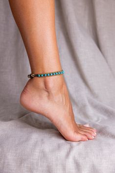 Shipping from Ibiza / Spain Have a piece of Ibiza and feel the island vibe. S H I P P I N G ∙ T I M E Europe: 1-2 weeks USA:  2-3 weeks Canada: 2-4 weeks Australia - Currently no shipments to Australia due to Corona Elegant and durable Pearl Shell Anklet.  The anklet is made with waxed cotton, brass and Pearl Shel. The locket is made with a stylish brass bell that goes into a hoop holding the anklet firmly.  Anklet length is 26 cm long (10.5 inches). The listing is for a SINGLE anklet. T O P ∙ Bohemian Turquoise Anklets For Festivals, Summer Festival Turquoise Beaded Bracelets, Turquoise Beachy Anklets For Vacation, Beachy Turquoise Anklets For Vacation, Turquoise Beaded Bracelets For Beach In Hippie Style, Adjustable Turquoise Anklets For Summer, Bohemian Beaded Anklet Bracelet For Festivals, Blue Bohemian Ankle Wrap Anklet, Turquoise Anklets As Beach Season Gift