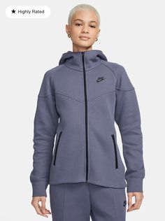 Elevate your sportswear game with this Nike Tech Windrunner Full Zip Hoodie and Pants set. The high neck, solid gray fleece fabric, and full zip closure offer both style and functionality, while the Nike logo accents add a touch of branding. The long sleeve hoodie with a hood is perfect for all seasons, from winter to summer, and can be worn for various sports and activities, from golf to basketball to bodybuilding. The cotton blend material is machine washable for easy care and maintenance. This unisex adults' athletic hoodie and pants set is perfect for those who appreciate both performance and style. Nike Windrunner, Nike Sportswear Tech Fleece, Nike Tech Fleece, Nike Tech, Tech Fleece, Carbon Black, Nike Hoodie, Sportswear Women, Heather Black