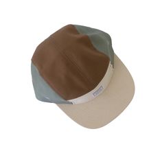 This colorblock hat is made of soft cotton and features an adjustable velcro back and fabric eyelets on the side panels. Size 1: Designed to fit kids aged 9 to 36 months Size 2: Designed to fit kids aged 3 to 5 years Size 3: Designed to fit kids aged 6 to 10 years Not sure on sizing? Check out our guide. Tips for cleaning your hat can be found here. Cream Flat Bill Hat For Outdoor, Cream Adjustable Baseball Cap For Outdoor, Brown Cotton Sun Hat, Cream 5-panel Summer Hat, Sporty Adjustable Multicolor Hat, Outdoor Cap With Cotton Sweatband, Outdoor Cotton Sweatband Cap, 5-panel Cotton Sports Hat, Green Adjustable Six-panel Hat