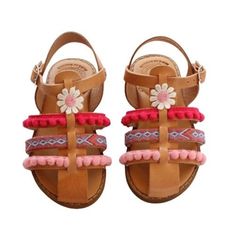 Discover our collection of boho sandals soft sole pink for girls. Perfect for kids, teens, infants, and juniors. Shop now for comfort and style. Handcrafted in Athens, Greece, these girls gladiator sandals soft sole feature genuine leather uppers adorned with delicate pearls. They boast a genuine leather insole for comfort and an anti-slip rubber sole for stability. Experience the enchantment of our stunning collection of children's leather sandals! Delve into the charm and heritage by discoveri Casual Round Toe Barefoot Sandals For Spring, Playful Open Toe Sandals For Summer, Casual Adjustable Barefoot Sandals For Spring, Playful Sandals For Summer Vacation, Playful Round Toe Sandals For The Beach, Playful Flat Sandals For The Beach, Playful Closed Toe Sandals For Summer, Playful Open Toe Beach Sandals, Playful Open Toe Sandals For The Beach