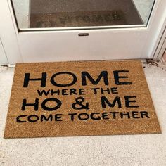 a door mat that says home where the ho and me come together