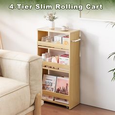 a book shelf sitting next to a couch in a living room with the text 4 - tier slim rolling cart