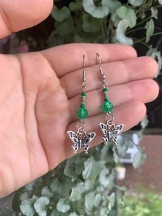 Unique, green beaded earrings with silver butterfly charms. Green Butterfly Earrings, Beaded Butterfly Earrings, Simple Bead Earrings, Green Beaded Earrings, Beaded Butterfly, Beaded Earring, Bangor, Green Butterfly, Handmade Ideas