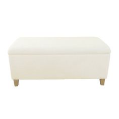 a white bench with wooden legs and a foot rest on the back side, against a white background