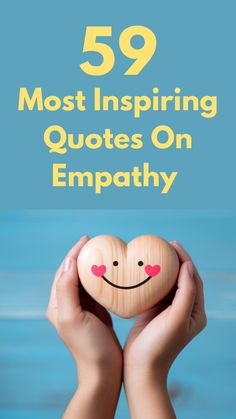 two hands holding a wooden heart with the words, 59 most inspiring quotes on empathty