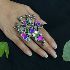 Add a hint of flamboyance to your outfit with these intricately designed and handcrafted high quality afghani glass rings. Wear this beautiful statement ring to become a head turner! Item Description: The look is stunning and preciously suitable for all kinds of dressy occasions. COLOR : Silver Metal: Brass With Good Quality Silver Plated For - Girls & Women OCCASION: PARTY WEAR , WEDDING, MARRIAGES, CASUAL, DAILY WEAR Ideal For Gifting Care Instruction : Avoid Heat & Chemicals Like perfume, Deo Glass Rings, Cocktail Glass, Trendy Jewelry, Cocktail Rings, Daily Wear, Indiana, Party Wear, Rings Statement, Happy Shopping