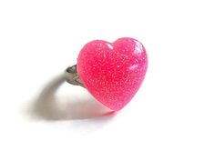 The neon pink heart ring was hand cast in resin and measures 19 x 19mm. The ring band is silver tone and adjustable. Custom colors available. More Allysin rings: http://www.etsy.com/shop/Allysin?section_id=6414116 Have a look at my other shops: Unique gemstone jewelry: http://jewelicide.etsy.com Pink Heart-shaped Resin Jewelry, Cute Pink Rings For Parties, Handmade Pink Heart-shaped Ring, Cute Pink Party Rings, Adjustable Pink Resin Rings, Cute Pink Heart-shaped Rings, Neon Pink Heart, Pink Heart Ring, Pink Heart Rings