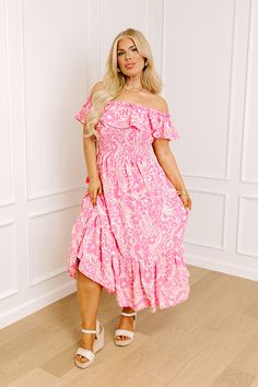 Heads are sure to turn when you arrive in this luxe pink plus size midi dress featuring lightweight breezy material patterned with a dreamy white floral print, a straight elastic off-shoulder neckline with an overlay bodice that forms flirty drop sleeves, a wide smocked waistline, and a relaxed skirt silhouette that cascades into a straight mid-calf length hemline! Measurements 1XL : Bust 34", Hip 54", Length 43.5", Sleeve Length 4", Waist 36". 2XL : Bust 36", Hip 56", Length 44", Sleeve Length Pink Off-shoulder Sundress Maxi Dress, Pink One-shoulder Midi Dress For Beach, Pink Off-shoulder Midi Dress For Beach, Flowy Floral Print Off-shoulder Dress, Flowy Off-shoulder Midi Dress For Spring, Pink Off-shoulder Casual Maxi Dress, Pink Casual Off Shoulder Dress For Spring, Off-shoulder Floral Print Sundress, Casual Pink Off Shoulder Dress For Spring