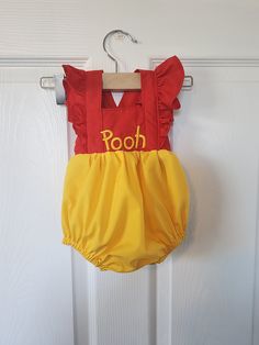 Winnie the Pooh romper are beautifully made with 100% cotton. Material is soft and breathable with an elasicised back.  Includes KAM snaps at the crotch for easy diaper changes.  Sizes Newborn to 6 Months comes with multiple snaps on straps for longer wear.  Sizes 9M to 2Y comes with back ties. Cute Red Cotton Jumpsuit And Rompers, Cute Red Cotton Jumpsuit/romper, Cute Bubble Romper Overall For Playtime, Cute Bubble Romper Overalls For Playtime, Cute Bubble Romper For Playtime, Cute Bubble Romper Overalls For Playwear, Cute Overall Bubble Romper For Playwear, Birthday Romper, Pooh Birthday