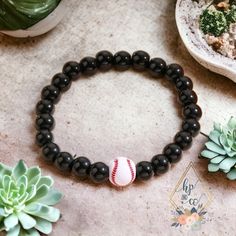 Black stretch bracelet with a softball bead. Perfect for anyone! Sports Accessories, Black Stretch, Stretch Bracelet, Stretch Bracelets, Softball, The Game, Jewelry Bracelets, Beaded Bracelets, Sleek