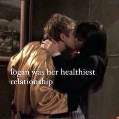 a man and woman kissing each other in front of a mirror with the words, logan was her healthist relationship