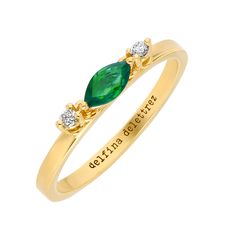 Classic gold band ring embellished with a ruby or a emerald marquise and finished with two playful white diamond charms dangling on the sides. Material: 18kt responsibly sourced yellow gold, ruby or emerald marquise 0.23ct, white diamonds 0.05ct ﻿Our diamonds are mined in conflict-free countries that are full participa Marquise Emerald Ring In Yellow Gold, Yellow Gold Marquise Emerald Ring, Gold Marquise Diamond Ring With Birthstone, Marquise Yellow Gold Diamond Ring For May Birthstone, Gold Marquise Cut Diamond Ring For May Birthstone, Marquise Cut Yellow Gold Emerald Ring As Gift, Yellow Gold Marquise Cut Emerald Ring Gift, Dancing Diamond, Marquise Ring